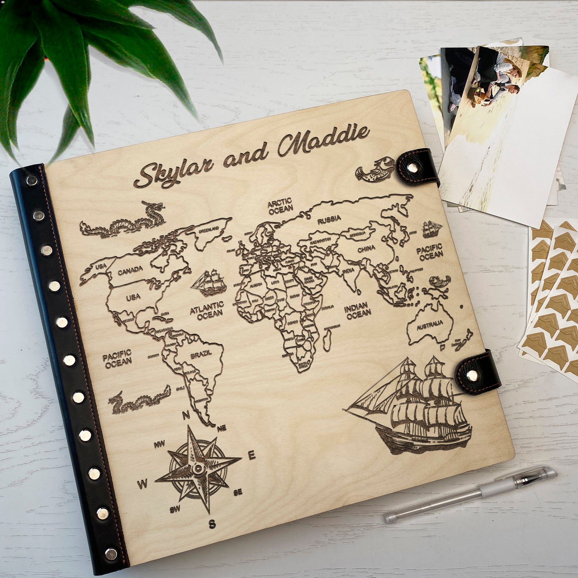 Personalized photo album with leather cover and World Map engraving