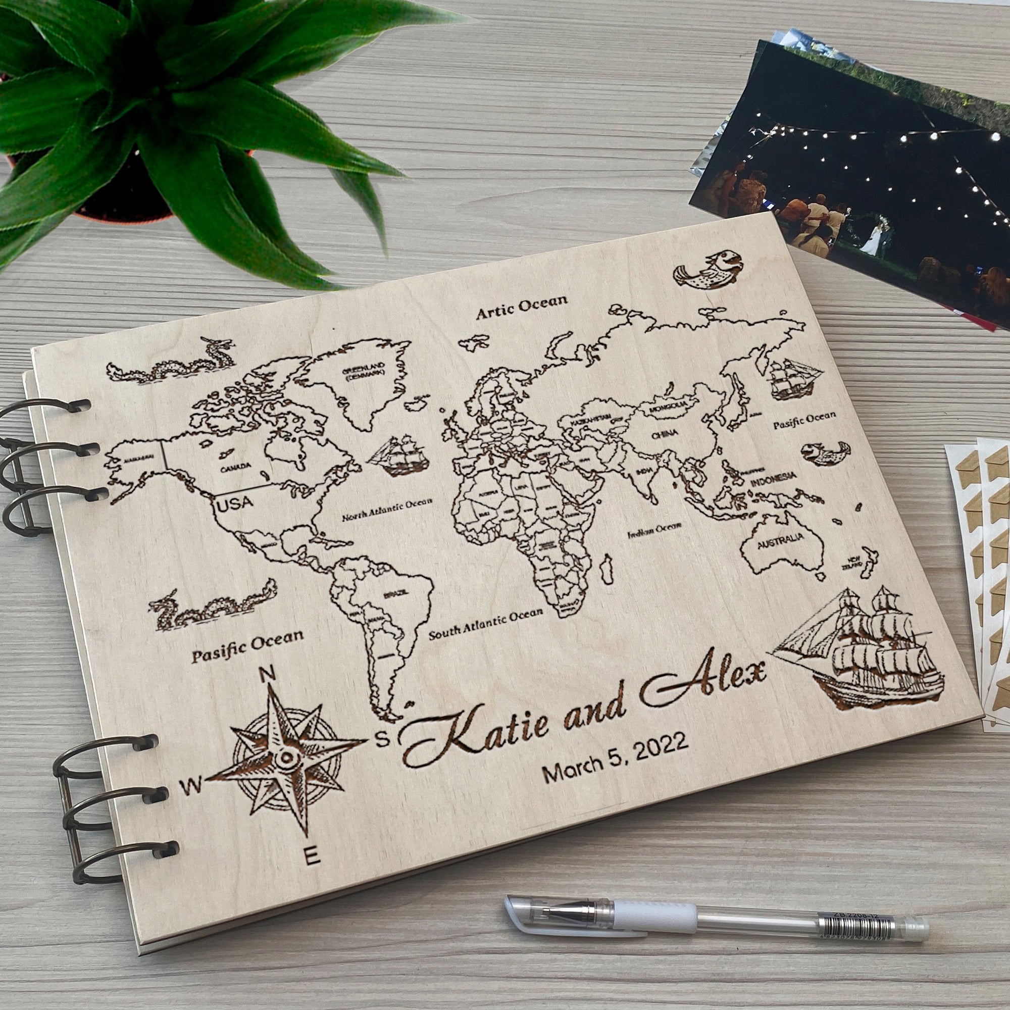 Personalized photo album cover and World map engraving